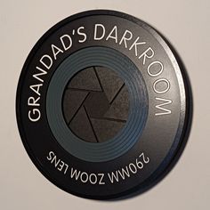 the grandad's darkroom logo is shown on a white background with black lettering