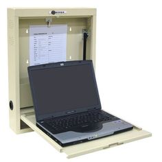 an open laptop computer sitting in a cabinet