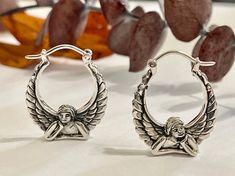 "Solid Sterling Silver Angel Hoop Earrings ( I made these from a 1980's Vintage mold) All my Cherub/Angel earrings are made with the great attention to detail and all are made by hand.  THESE ARE NOT HOLLOW THEY ARE SOLID STERLING SILVER- (As you can tell from the weight) **For More Selections Visit My Other Store** https://www.etsy.com/shop/JewelsOfOsiris COMPOSITION: Sterling Silver CONDITION: New WEIGHT: 7.1 Grams MEASUREMENT: Hoop with Angel - 1\" height  x 3/4\" mm wide MARKS: 925" Retro Small Hoop Earrings For Gifts, Vintage Nickel-free Hoop Earrings, Vintage Hoop Clip-on Earrings For Gift, Vintage Handmade Hoop Earrings For Anniversary, Handmade Vintage Hoop Earrings For Anniversary, Vintage Metal Hoop Earrings As Gift, Handmade Small Hoop Vintage Earrings, Handmade Vintage Small Hoop Earrings, Handmade Vintage Sterling Silver Hoop Earrings