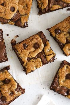 chocolate chip cookie bars cut into squares on a white surface