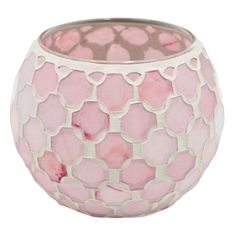 a pink and white vase sitting on top of a table