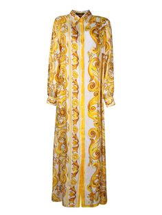 Long dress in light and breathable fabric with Maiolica print. Features frontal button closure and a classic collar.. This Dolce & Gabbana long dress captivates with its lively yellow and gold Maiolica print, offering an elegant cut that gently cascades down the body. Perfect for spectacular occasions or a sophisticated evening outGender: WomenMaterial: 100% SILKColor: YELLOWMade in: ImportedProduct ID: F6JDET HI1TK HG3TN*Import tax/duty will be calculated at checkout (If applicable) Luxury Gold Maxi Evening Dress, Luxury Baroque Print Dress, Luxury Yellow Silk Dresses, Designer Printed Summer Dresses, Elegant Silk Dress With Baroque Print, Formal Silk Printed Dress, Silk Printed Formal Dresses, Elegant Printed Maxi Dress For Daywear, Formal Yellow Maxi Dress