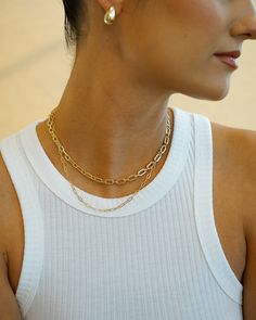 Make a statement with the Serena Paperclip Chain Necklace! Choose from silver or gold and combine with other pieces to create enviable layered looks! Perfect for adding a touch of chic radiance to any outfit. NECKLACE FEATURES Material: Brass, 24K Gold Filled, White Gold Filled Chain Width: Approx. 5.5mm x 10mm Necklace measures 16" with a 2" extender Chain Color: Gold, Silver Lead Free, Nickel Free Paperclip Necklace Outfit, Chic Layered Metal Necklace With Chunky Chain, Chic Metal Layered Necklace With Chunky Chain, Chic Layered Necklace With Chunky Chain, Chic Double Strand Chain Necklace, Everyday Jewelry With Double Chain And Rectangular Links, Everyday Jewelry With Double Rectangular Links, Elegant Double Strand Layered Necklace With Chunky Chain, Chic Metal Layered Necklace With Double Chain