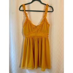 Yellow Nbd Mini Dress W/ Ruffle Detail. Nwot, Size M Lined Yellow Mini Dress, Yellow Lined Mini Dress, Yellow Mini Sundress With Ruffles, Yellow Ruffled Mini Sundress, Yellow Ruffled Sundress For Summer, Yellow V-neck Sundress With Ruffles, Chic Yellow Flowy Mini Dress, Flowy Yellow Sundress With Ruffles, Yellow Ruffled Sundress For Party