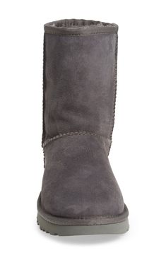 Pretreated to protect against moisture and staining, this timeless UGG boot is comfier and cozier than ever, with a soft lining crafted from genuine shearling. The Treadlite sole adds increased cushioning, durability and traction on both wet and dry surfaces. Style Name:UGG Classic Ii Genuine Shearling Lined Short Boot (Women). Style Number: 5179825. Classic Boots With Sheepskin And Suede Lining, Classic Sheepskin Boots With Suede Lining, Classic Sheepskin Boots For Fall, Classic Shearling Boots With Round Toe, Classic Fall Shearling Boots, Sheepskin Boots With Round Toe For Cold Weather, Sheepskin Boots For Cold Weather With Round Toe, Ugg Boot, Short Boot