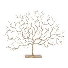 a metal tree sculpture sitting on top of a wooden base with no leaves in it