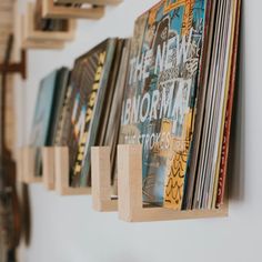 there are many records hanging on the wall