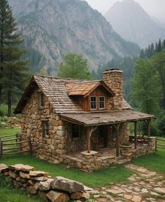 a small stone cabin in the mountains