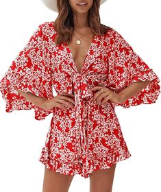 Red & White Floral Ruffled Tied Shorts Romper POLYESTER Imported Drawstring closure Machine Wash Tie Front rompers made of lightweight and soft printed fabric, double layer fabric ,not see through. soft, comfortable, breathable, skin-friendly, comfy to touch and wear. Brand Size Dress Bust Waist Hip XS 0-2 31-32.5'' 23-24'' 31-34" S 4--6 33-35'' 25-26'' 35-37" M 8--10 35-36'' 27-28'' 38-39" L 12--14 38-40'' 29-31'' 40-42" XL 14-16 40-42'' 33.5-36'' 44-46" 2XL 18-20 42-44'' 37-40'' 47-50" 3XL 22-24 44-46'' 41-46'' 51-55" 4XL 26-28 46-48'' 47-50'' 56-60" Red Printed V-neck Jumpsuits And Rompers, Summer Flowy Jumpsuits And Rompers For Brunch, Flowy Summer Jumpsuits And Rompers For Brunch, Red Jumpsuits And Rompers For Spring Beach Outings, Red Jumpsuits And Rompers For Beach In Spring, Summer Printed Jumpsuits And Rompers For Brunch, Printed Jumpsuits And Rompers For Summer Brunch, Bohemian Printed Jumpsuits And Rompers For Spring, Chic Red Jumpsuits And Rompers For Vacation