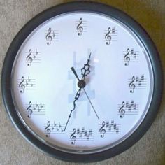 a clock with musical notes on the face