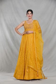 Mango yellow sleeveless full length gown with Mughal bloom embroidery using thread, sequin, beads and cutdana highlights. Paired with a ditsy sequin floret work dupatta. - Aza Fashions Bloom Embroidery, Mango Yellow, Gown With Dupatta, Gown Pattern, Full Length Gowns, Beaded Neckline, Aza Fashion, Types Of Sleeves, Full Length