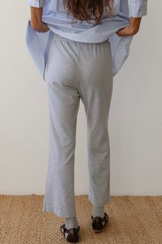 The Baby Rib Scallop Pant is crafted from our dreamiest, butter-soft fabric—it's like a hug from a stick of butter (you truly have to feel it to believe it). Designed with a comfy elastic waistband, cropped fit, and scalloped edges at the hem. These pants blend cozy comfort with effortless style. Made in Los Angeles Gray Sweatpants With Ribbed Waistband For Spring, Stretch Cotton Bottoms For Loungewear, Stretch Ankle-length Lounge Bottoms, Stretch Ankle Pants For Lounging, Stretch Cotton Gray Bottoms, Bottoms With Elastic Waistband For Lounging, Fitted Bottoms With Elastic Waistband For Lounging, Comfort Stretch Trousers For Loungewear, Stretch Gray Cotton Bottoms