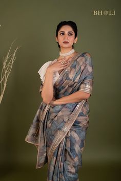 This exquisite handloom tussar silk saree features intricate gota and pearl work, handcrafted with precision and care. The digitally printed design adds a modern touch to this traditional piece, while the soft and flowy fabric ensures comfort and elegance. The perfect choice for those seeking a smart and contemporary s Luxury Tussar Silk Handloom Saree, Luxury Cotton Silk Elegant Saree, Diwali Cotton Silk Saree With Gota Work, Unstitched Cotton Silk Saree With Gota Work, Semi-stitched Tussar Silk Saree With Gota Work, Tussar Silk Saree With Gota Work In Traditional Drape, Tussar Silk Pre-draped Saree With Gota Work, Elegant Tussar Silk Pre-draped Saree With Gota Work, Bollywood Style Pre-draped Tussar Saree With Gota Work