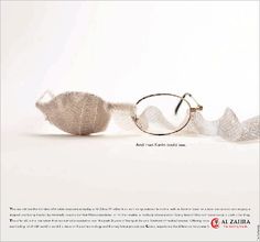 an advertisement for eyeglasses with white fabric on it