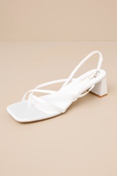 Subtly sultry and always chic, the Lulus Kerrie White Satin Strappy Low Heel Sandals will add a luxe to touch to any ensemble! Sleek woven satin shapes these unforgettable heels that have a square footbed, a thong-style upper, and a network of slender straps throughout. A matching, adjustable slingback strap secures with a shiny gold buckle, all atop cute block heel. 2" wrapped block heel. Cushioned insole. Felted rubber sole has nonskid markings. Man made materials. Imported. Lulus | Kerrie Whi White Sandals Heels, Low Heel Sandals, Sandal Heels, Low Heel Shoes, Black Sandals Heels, White Heels, To Touch, Heel Sandal, White Flats