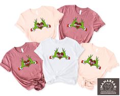 Custom Grinch Family Shirt, Grinch Heart Hand Shirt, Matching Grinch Family Pajamas, Personalized Grinch Christmas Party Shirts, Grinchmas Holiday Shirt Welcome to MamaBearApparell! I am a professional designer and a Mama of twins. As a professional designer, I am delighted to offer you designed t-shirts that your entire family will love and cherish, making your special moments even more beautiful. We are working to provide you with high-quality soft t-shirts and sweatshirts with trendy designs. We prioritize quality materials and stunning designs to offer you the best service possible. Our handmade items will be the perfect choice for your celebrations, vacations, graduations, or birthday & wedding parties and holidays (such as Christmas, Thanksgiving ..)  Discount available on bulk order Grinch Pajamas, Grinch Heart, Grinch Christmas Party, Christmas Party Shirts, Family Shirts Matching, Family Shirt, Holiday Shirt, Wedding Parties, Grinch Christmas