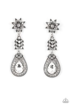 Dotted in dainty white rhinestones, a studded silver flower gives way to a leafy frame that is delicately suspended above a decorative white rhinestone dotted teardrop frame. An oversized teardrop gem seemingly floats inside the center of the lowermost frame, adding iridescent dazzle to the floral fairytale. Due to its prismatic palette, color may vary. Earring attaches to a standard post fitting. Fantasy Earrings, White Earring, Dainty Band, Feeling Pretty, Floral Accessories, Paparazzi Accessories, White Rhinestone, Rhinestone Studs, White Earrings