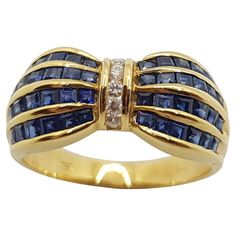 Blue Sapphire 1.83 carats with Diamond 0.10 carat Ring set in 18 Karat Gold Settings Width: 2.0 cm Length: 0.9 cm Ring Size: 54 Total Weight: 6.83 grams "We first opened doors in 1980 when it was then situated in the vicinity of the Victory Monument; a small and modest storefront with a couple of counters. From its humble beginnings to where it stands today, our company has proven its abilities as a jeweler. Since the beginning, we have been supplying fine quality pieces to dealers, wholesalers Formal Diamond Sapphire Ring Channel Set, Formal Sapphire Ring With Channel Set Diamonds, Formal Channel Set Sapphire And Diamond Ring, Yellow Gold Sapphire Ring With Channel Set Diamond, Luxury Yellow Gold Sapphire Ring Channel Set, Luxury Sapphire Ring With Diamond Channel Set, Formal Baguette Cut Sapphire Ring Channel Set, Formal Baguette Cut Channel Set Sapphire Ring, Formal Yellow Gold Channel Set Sapphire Ring