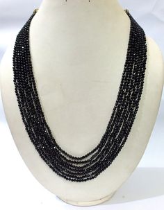 7 Strand Black Tourmaline Gemstone Necklace, Natural Tourmaline 3-4mm Rondelle Faceted Beads, Black Tourmaline 7 Layer Jewelry Necklace Gemstone :- Black Tourmaline Size :- 3-4mm Approx Necklace Strand :- 7 Strand Shape :_ Rondelle Faceted Color :- Black Quality :- AAA GRADE https://www.etsy.com/in-en/shop/LatestBeadsJewellery?ref=simple-shop-header-name&listing_id=720939504 Your Feedback is very Important for us. If you have any problem regarding packaging or product, kindly contact us to r Luxury Black Briolette Necklace, Black Crystal Necklaces With Round Gemstone Beads, Black Rondelle Beaded Necklaces, Black Rondelle Gemstone Beaded Necklace, Black Rondelle Gemstone Bead Necklace, Black Faceted Beaded Necklaces, Black Faceted Round Beaded Necklaces, Clear Quartz Jewelry, Black Tourmaline Jewelry