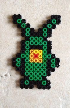 an image of a beaded animal made out of beads