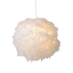 a white feather light hanging from a ceiling