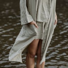 Our solid colored sleepwear collection is made from our heirloom linen blended with bamboo derived rayon for extra drape and softness. The Nola Robe is a mid length robe with loose ¾ length sleeves, a self tie, pockets, and an oversized fit. It’s the perfect lightweight piece to throw on over your pajamas, after a shower, or anytime you want to lounge. Linen Long Sleeve Robe For Daywear, Long Sleeve Linen Robe For Daywear, Summer Lounging Wrap Robe, Summer Wrap Robe For Lounging, Long Summer Lounging Robe, Long Summer Robe For Lounging, Long Summer Sleep Robe, Long Summer Robe For Sleep, Oversized Wrap Robe For Loungewear