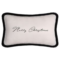 a black and white pillow with the words merry christmas written on it's side