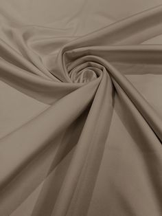 "VIP TEXTILE INC. Dear customer We are direct importers of all our fabrics, contact us for wholesale prices. (wholesale = 25 yards +) Thank you 100% Polyester : 60\" inches wide : 6.1oz per yard Matte Satin (Peau de Soie) Fabric This Fabric is 59''/60'' in width. Each order comes in 1 full length piece. For example, if you order a quantity of 5, you will receive a 5 yard piece measuring 59''/60'' x 180''. If you order a quantity of 15, you will receive a full 15 yard piece measuring 59''/60'' x Elegant Beige Fabric For Wedding, Fitted Solid Color Fabric For Formal Occasions, Formal Solid Fitted Fabric, Fitted Solid Fabric For Formal Wear, Elegant Beige Wedding Fabric, Duchess Fabric, Costume Wedding, Stretch Satin Fabric, Wedding Sand