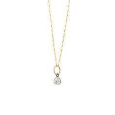 The 14k gold BEZI baby diamond charm adds a hint of simple elegance to any neckline. Looks amazing as a single charm, or it layers beautifully with other charms. Full cut round white diamond in a bezel setting. We also have a larger diamond charm available, see OTTO. You can purchase charm only, or add our recommended chain as shown. Layering image shown with NIKI baby charm. Full cut round white diamond, approximately .06 ctw Recommended chain is 14k gold 1.0mm diamond cut ball chain Designed a Elegant Birthstone Necklace With Charms, Classic Yellow Gold Diamond Charm Necklace, 14k White Gold Round Pendant Charm Necklace, 14k Gold Pendant Necklace With Single Diamond, 14k White Gold Charm Necklace With Round Pendant, Yellow Gold Necklace With Single Diamond Pendant, 14k Yellow Gold Birthstone Necklace With Round Pendant, Elegant 14k Stamped Yellow Gold Charm Necklaces, White Gold 14k Charms Necklace