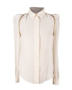 Guaranteed authentic Chloe silk top in winter white and metal open work in a brushed gold.Cutout gold hardware around the arms at shoulder area.Shoulders are shaped and accentuated.Top has hidden placket and cuffs have 1 embossed button.Rounded collar.**See the matching pant listed.**This listing is the blouse onlyfina Noble Lady, Metal Detail, Winter Tops, Metal Work, White Blouse, Winter White, Silk Top, The Closet, Tapered Legs