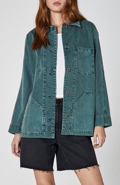 A boxy fit and a plethora of patch pockets lend workwear-inspired style to this denim jacket cast in a unique green wash. 29 1/2" length Front button closure Spread collar Front patch pockets 100% cotton Hand wash, line dry Imported Washed Medium Wash Utility Jacket, Denim Utility Jacket Washed, Denim Utility Jacket Washed Style, Green Cotton Utility Jacket With Buttoned Pockets, Denim Utility Jacket With Patch Pockets, Green Workwear Shacket With Button Closure, Green Shacket For Work With Button Closure, Green Button Closure Shacket For Work, Everyday Washed Utility Jacket