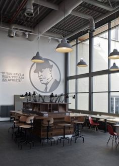 the inside of a restaurant with tables and chairs