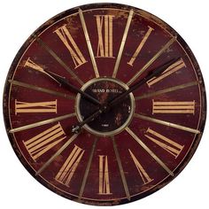 an old clock with roman numerals on the face