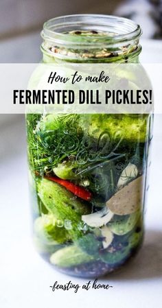 a mason jar filled with pickles and vegetables