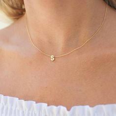 A perfect personalized piece. Add any initial of your choice to our delicate gold chain. This is the perfect gift idea for your best friend, sister, mother and daughter. …………………………………. Details: Available in Gold Plated Curb Chain Pendant is Matte Gold Plated measuring 5 x 7.5mm Size inclusive and made to order just for you Not waterproof Average necklace length is 18" About Your Jewelry If you are not wearing your jewelry it is best to store it in a cool, dry place such as your gift box that is Delicate Gold Chain, For Your Best Friend, Mother And Daughter, Block Lettering, Letter Necklace, Chain Pendant, Curb Chain, Matte Gold, Chain Pendants