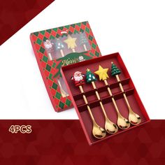 four christmas spoons in a gift box