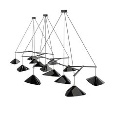 several black lamps hanging from the ceiling in an artistic manner, with one light on each side