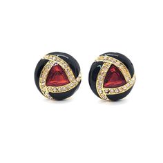 "**DISCLAIMER - this item is vintage and as such will likely not be in perfect condition.  Please review the description and photos carefully before purchase.** **DISCLAIMER - this item is vintage and as such will likely not be in perfect condition.  Please review the description and photos carefully before purchase.** Rad vintage red and black enameled clip on earrings.  The earrings are gold tone metal with an enamled geometric design in black and red with rhinestone accents. Made in the style of Ciner. Unknown maker. Not marked. c 1980s Condition is excellent.  Very little sign of use. There are no dents or dings. No chips or cracks. No loose or missing stones. No corrosion. Ready to wear. Each earrings measures 1\" in diameter." Red Enamel Clip-on Earrings, Vintage Red Clip-on Earrings For Anniversary, Red Vintage Clip-on Earrings For Anniversary, Vintage Red Clip-on Earrings For Evening, Vintage Black Enamel Clip-on Earrings, Vintage Black Round Clip-on Earrings, Vintage Enamel Earrings For Evening, Black Vintage Round Clip-on Earrings, Vintage Style Enamel Earrings For Evening