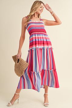 Material:100%Polyester Embrace the timeless charm of the multicolor stripes pattern, making this long dress a classic and popular choice. Achieve a perfect balance of sexiness and elegance with the ruffled straps design and maxi length, ensuring a stylish and sophisticated look. Loved by modern ladies, the smocked bodice and tiered flowy silhouette add a contemporary touch, providing both comfort and fashion-forward style. Versatile for various occasions, this maxi dress is perfect for holidays, Multicolor Midi Maxi Dress With Smocked Bodice, Multicolor Smocked Bodice Sundress, Multicolor Smocked Midi Sundress, Multicolor Midi Smocked Sundress, Casual Multicolor Midi Dress With Smocked Back, Multicolor Tiered Maxi Dress With Smocked Bodice, Chic Multicolor Maxi Dress With Smocked Back, Multicolor Smocked Back Midi Dress, Striped Ruffle Midi Dress For Beach