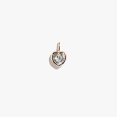 A single heart shaped jewel charm. Magical jeweler quality CZ gem, 2.8 carats, hand set in an open-backed bezel setting and secured with invisible prongs to let in maximum light. Pair with any of our fitting chain necklaces or bracelets. Single pendant only; chain sold separately. Waterproof, more information on jewelry care below. Waterproof but not recommended for daily shower wear due to scratches over time from loofahs or exfoliants. More information on care at bottom of page. Ready-Made use Cubic Zirconia Heart Cut Birthstone Jewelry, Round Cut Jewelry With Heart Charm For Valentine's Day, Heart Shaped Jewelry With Prong Setting For Gifts, Heart-shaped Jewelry With Bezel Setting For Valentine's Day, Heart-shaped Bezel Set Jewelry For Valentine's Day, Classic Heart-shaped Jewelry With Prong Setting, Everyday Heart Cut Diamond Jewelry, Classic Heart Shaped Birthstone Jewelry, Classic Heart-shaped Birthstone Jewelry