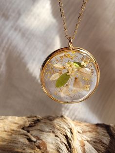 Discover the enchanting beauty of nature with this Pressed Flower Necklace--a unique and delightful resin pendant inspired by the serene essence of cottagecore life. 🌼 Botanical Poetry 🌼 This necklace is a canvas of natural artistry, featuring real pressed flowers lovingly encased in resin. Each petal tells a story of the outdoors, making it a unique gift for those who embrace the beauty of plants. 🌿 Cottagecore Charm 🌿 Embrace the rustic elegance of cottagecore with this enchanting pendant. Plants Cottagecore, Nature Cottagecore, Cottagecore Life, Cottagecore Nature, Pressed Flower Necklace, Unique Jewelry Gifts, Pressed Flower, Resin Pendant, Rustic Elegance