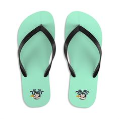 Let your feet breathe! With a high quality print, these Flip Flops are a must-have item on the beach, around the house or to brighten up a special outfit on hot summer days. .: 100% Rubber sole .: 100% Polyester jersey sole cover .: Multiple sizes .: Textured black thong strap .: Runs bigger than usual Green Casual Flip Flops For Vacation, Casual Green Flip Flops For Vacation, Green Casual Flip Flops For Beach Season, Casual Green Flip Flops For Beach Season, Sporty Flip Flops For Summer Vacation, Sporty Summer Flip Flops For Vacation, Sporty Summer Vacation Flip Flops, Green Graphic Print Swimwear For Summer, Comfortable Flip Flops For Pool And Beach Season