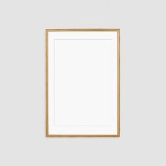 an empty wooden frame hanging on the wall