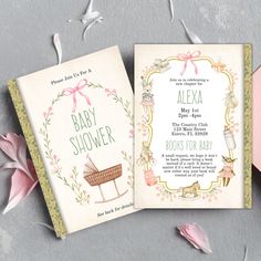 two baby shower cards with pink flowers on the side and an envelope in the middle