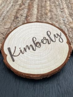 a piece of wood with the word kingdom written on it