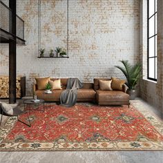 a living room filled with furniture and a brick wall