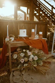 the table is set up with candles and flowers