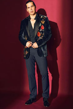 Black tuxedo jacket in silk velvet base with floral resham embroidery.

#Perniaspopupshop #menswear #ethnic #whatiworewastrending #ppuslove #tuxedoset #velvet #silk #velvet #floralembroidery #formalwear #eveninglook #outing #style #fashion Rohit Bal Menswear, Embroidered Tuxedo, Black Tuxedo Jacket, Resham Embroidery, Rohit Bal, Suit Pant