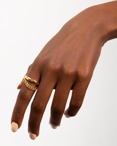 A textured finish on this curb chain stackable ring brings out its minimalistic subversive-basic design, giving it hardware yet classic silhouette. Celebrate the modern yet unexpected, wrapped up in modern, wearable artistry.

Band Width: 7mm
Band Thickness: 1.8mm
Material: 18k Gold Plated On Brass Minimalist Metal Chain Rings, Modern Yellow Gold Metal Midi Rings, Modern Yellow Gold Midi Rings, Minimalist Tarnish-resistant Midi Rings, Modern Metal Midi Rings Tarnish Resistant, Minimalist Chain Link Metal Rings, Minimalist Metal Rings With Adjustable Chain, Minimalist Metal Chain Promise Ring, Modern Adjustable Chain Ring