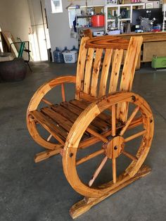 a wooden rocking chair made out of wood in a room with shelves and other items